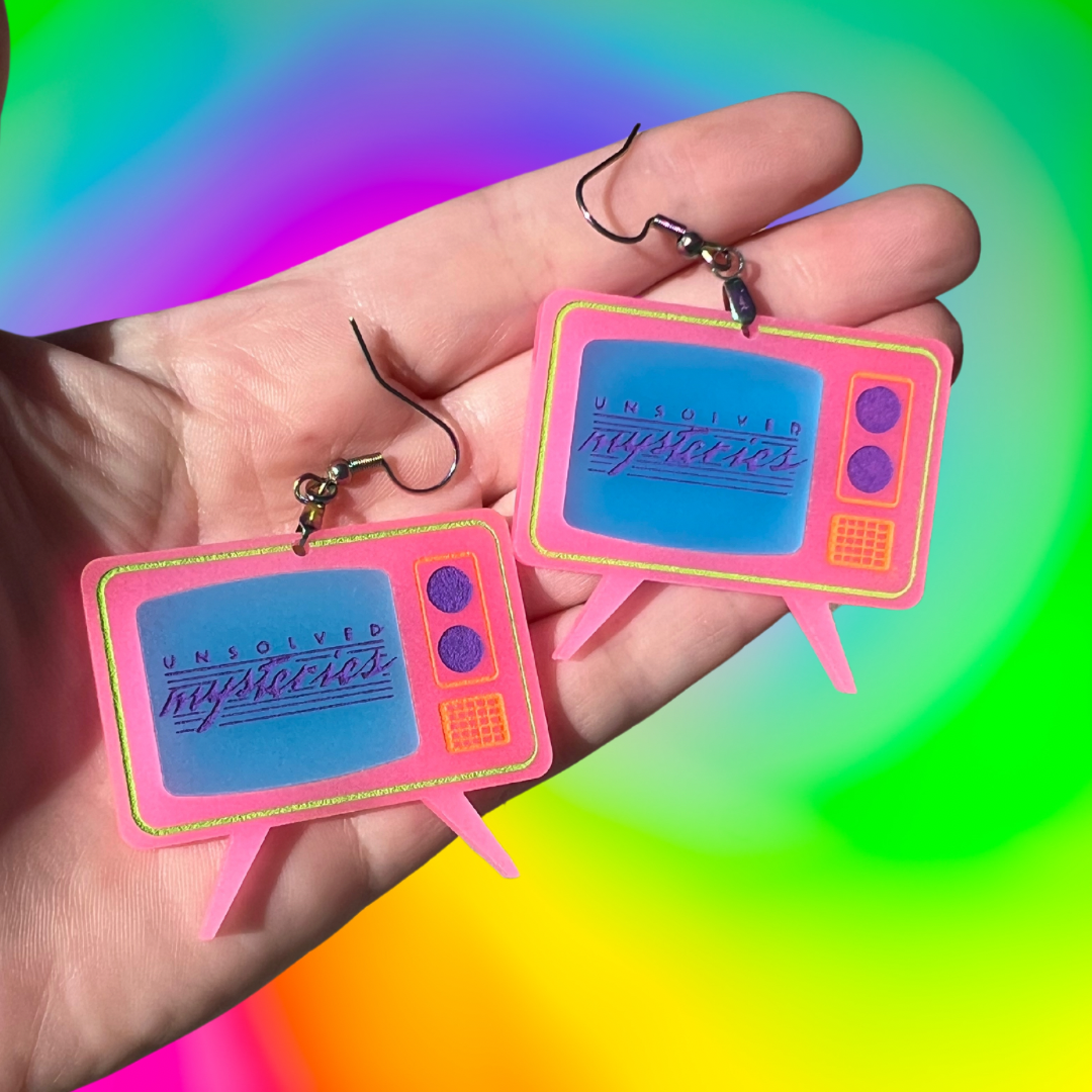 Unsolved Mysteries Glow in the Dark Dangle Earrings