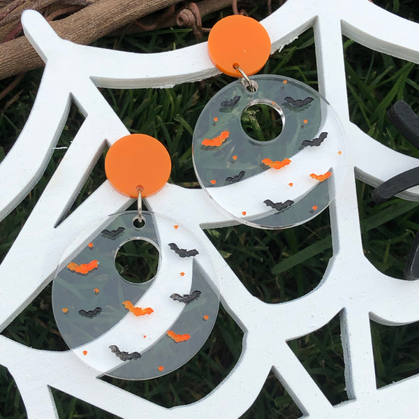 Circle Bat Silhouette Dangle Earrings Clear with Black and Orange